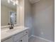 Clean bathroom with white vanity and black matte faucet at 4348 Meadow Vista Dr, Stonecrest, GA 30038