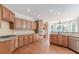 Spacious kitchen with hardwood floors and granite countertops at 4348 Meadow Vista Dr, Stonecrest, GA 30038