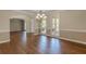 Bright dining room featuring hardwood floors and chandelier at 4348 Meadow Vista Dr, Stonecrest, GA 30038