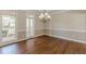 Bright dining room featuring hardwood floors and chandelier at 4348 Meadow Vista Dr, Stonecrest, GA 30038