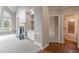 Spacious living room featuring a fireplace and built-in shelving at 4348 Meadow Vista Dr, Stonecrest, GA 30038