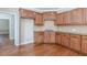 Kitchen with wood cabinets and granite countertops at 4348 Meadow Vista Dr, Stonecrest, GA 30038