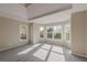 Spacious main bedroom with bay window and neutral walls at 4348 Meadow Vista Dr, Stonecrest, GA 30038