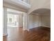 Spacious dining room with hardwood floors and elegant chandelier at 4348 Meadow Vista Dr, Stonecrest, GA 30038