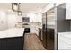 Modern kitchen with stainless steel appliances and quartz countertops at 7543 Palmetto Way, Riverdale, GA 30274