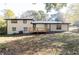White ranch home with new deck and fenced-in backyard at 7543 Palmetto Way, Riverdale, GA 30274
