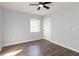 Bright bedroom with hardwood floors and neutral walls at 7543 Palmetto Way, Riverdale, GA 30274