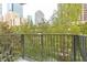 Private balcony overlooking treetops and city skyline at 195 14Th Ne St # 505, Atlanta, GA 30309