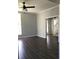 Bright living room with hardwood floors and an open floor plan at 3021 Stone Mountain St, Lithonia, GA 30058