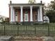 Historic brick home with classic columns at 3021 Stone Mountain St, Lithonia, GA 30058