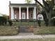 Historic brick home with a grand entrance at 3021 Stone Mountain St, Lithonia, GA 30058