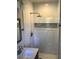 Modern bathroom with marble shower and updated fixtures at 3021 Stone Mountain St, Lithonia, GA 30058
