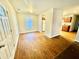 Bright dining area with wood-look floors and access to kitchen at 278 Privette Sw Rd, Marietta, GA 30008