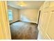 Spacious bedroom with brown carpet and large window at 278 Privette Sw Rd, Marietta, GA 30008