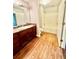 Bathroom with a tub, toilet and wood vanity at 278 Privette Sw Rd, Marietta, GA 30008