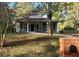 Gray house with white columns, black shutters, and landscaping at 278 Privette Sw Rd, Marietta, GA 30008