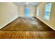 Large living room featuring carpet and multiple windows at 278 Privette Sw Rd, Marietta, GA 30008