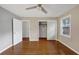 Empty bedroom with hardwood floors, ceiling fan, closet, and window at 2283 Clifton Springs Mnr, Decatur, GA 30034