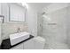 Modern bathroom with a frameless shower and stylish sink vanity at 200 Haleys Ct, Woodstock, GA 30188