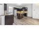 Kitchen with granite countertops and dark wood cabinets at 200 Haleys Ct, Woodstock, GA 30188