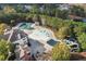 Aerial view of community pool, clubhouse, and homes at 307 Jessica Way, Canton, GA 30114