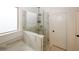 Bathroom with walk-in shower and separate tub at 1840 Wellston Dr, Lawrenceville, GA 30043