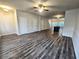 Open concept living room and kitchen with LVP flooring at 1535 Iris Walk, Jonesboro, GA 30238