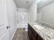Clean bathroom with granite vanity and a bathtub at 1535 Iris Walk, Jonesboro, GA 30238
