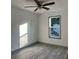 Well-lit bedroom with vinyl plank flooring and ceiling fan at 2688 Landington Way, Duluth, GA 30096