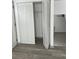 Closet with bi-fold doors and wood flooring at 2688 Landington Way, Duluth, GA 30096