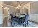 Formal dining room with marble table and chandelier at 3960 Carissa Trce, Cumming, GA 30040