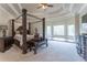 Grand main bedroom with a four-poster bed and ample natural light at 3960 Carissa Trce, Cumming, GA 30040