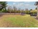 Spacious backyard with trampoline and patio furniture at 3960 Carissa Trce, Cumming, GA 30040
