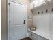 Functional mudroom with built-in bench and storage at 3960 Carissa Trce, Cumming, GA 30040