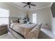 Comfortable bedroom with a king-size bed and plenty of natural light at 3960 Carissa Trce, Cumming, GA 30040