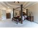 Luxurious main bedroom with ensuite bath access and large windows at 3960 Carissa Trce, Cumming, GA 30040