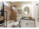 Clean bathroom with tub, shower, granite vanity, and tile flooring at 3960 Carissa Trce, Cumming, GA 30040