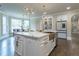 Bright kitchen features a large island with a copper sink at 3960 Carissa Trce, Cumming, GA 30040