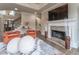 Gathering room with fireplace, hardwood floors, and comfortable seating at 3960 Carissa Trce, Cumming, GA 30040