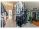 Large walk-in closet with extensive hanging and shelving at 3960 Carissa Trce, Cumming, GA 30040