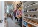 Large walk-in closet with ample shelving, drawers, and hanging space at 3960 Carissa Trce, Cumming, GA 30040