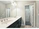 Shared bathroom with double vanity and shower at 2128 Sonoma Se Dr, Smyrna, GA 30080