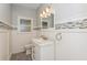 Modern bathroom featuring marble vanity and mosaic tile at 2342 Timberwolf Ct, Buford, GA 30519