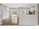 Bright living room featuring hardwood floors and sliding glass doors to backyard at 1730 Stanwood Nw Dr, Kennesaw, GA 30152