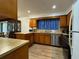 Kitchen with stainless steel appliances and wood cabinets at 2194 Klondike Sw Rd, Conyers, GA 30094