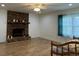 Spacious living room featuring a brick fireplace and hardwood floors at 2194 Klondike Sw Rd, Conyers, GA 30094