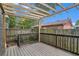 Private backyard with deck, pergola, and fenced-in area at 400 Bass Sw St, Atlanta, GA 30310