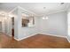 Bright dining room with hardwood floors and kitchen access at 400 Bass Sw St, Atlanta, GA 30310