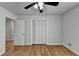Bright bedroom with hardwood floors and ceiling fan at 1365 Renee Dr, Decatur, GA 30035