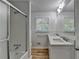 Clean bathroom, featuring double vanity and shower at 1365 Renee Dr, Decatur, GA 30035